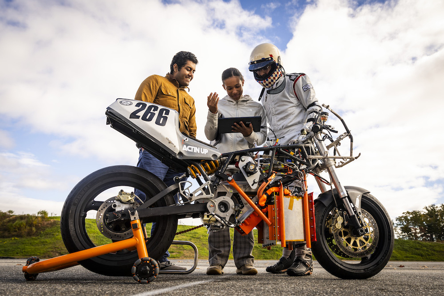 Screenshot from 'For the Love of Speed: Building a Hydrogen-Powered Motorcycle' by MIT News, featuring Rachel Mohammed '27 at the center.