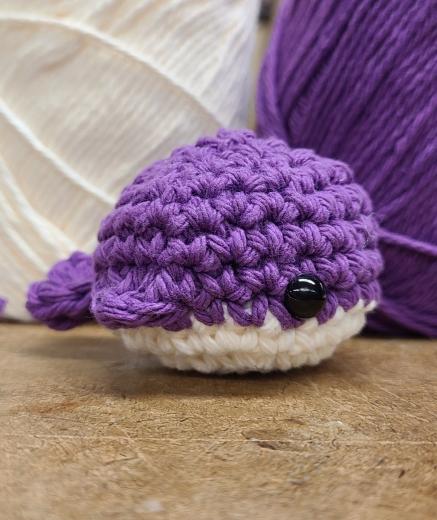 purple crocheted whale