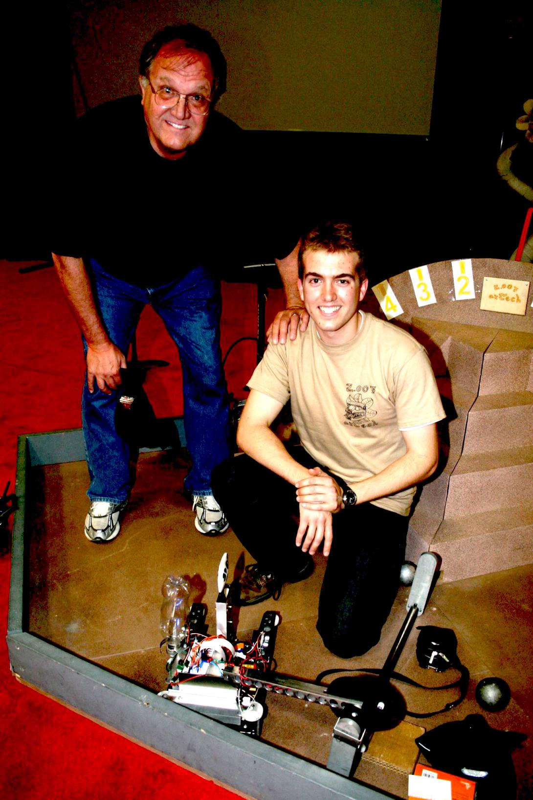 Randall with his dad at the 2010 2.007 robot competition