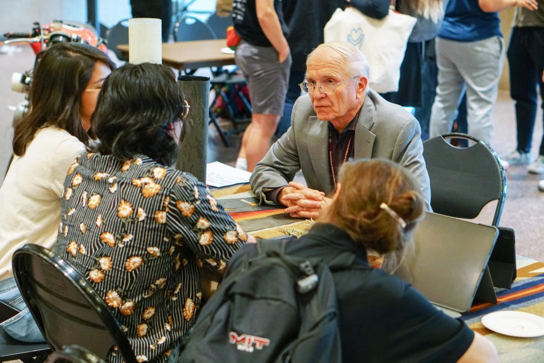 Professor J. Kim Vandiver speaking with students on the First Nations Launch team